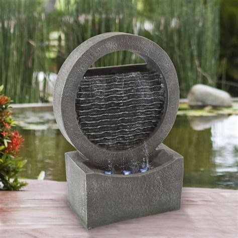Garden fountains increase the appeal of flower beds and surrounding trees. . Backyard fountains lowes